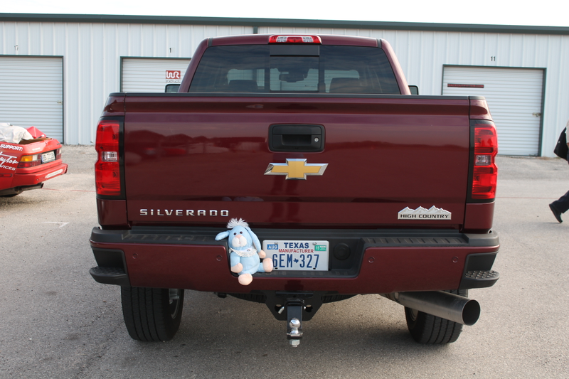 Illustration for article titled Towing A Race Car With A Small House: The Silverado 2500 High Country